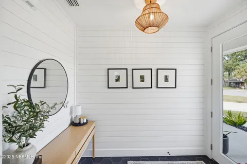 a view of entryway with wooden floor