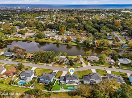 an aerial view of lake residential house with outdoor space