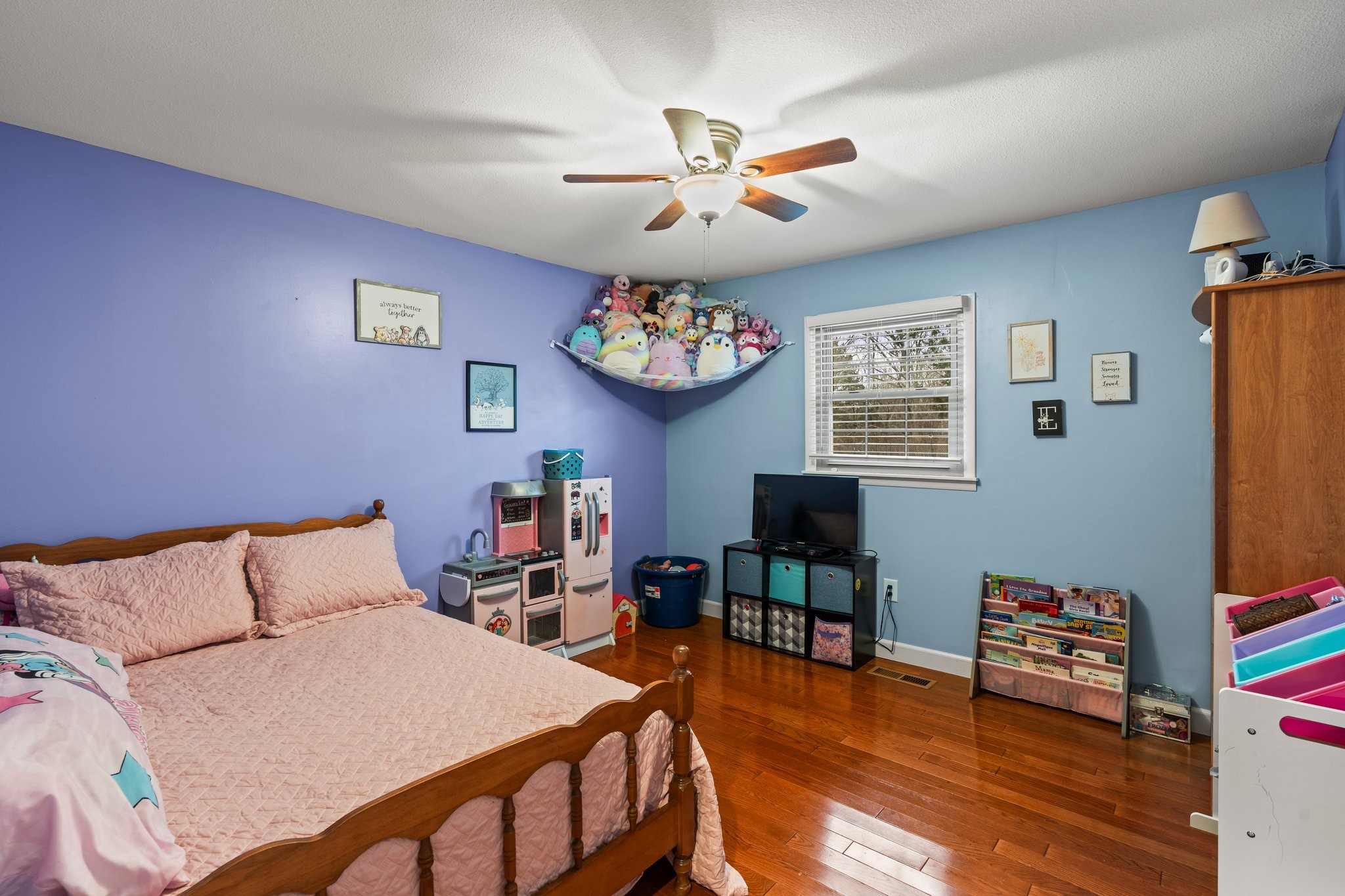 759 Little Hurricane Road Winchester, TN 37398 - Photo 20 of 30 a bedroom with a bed and a chandelier