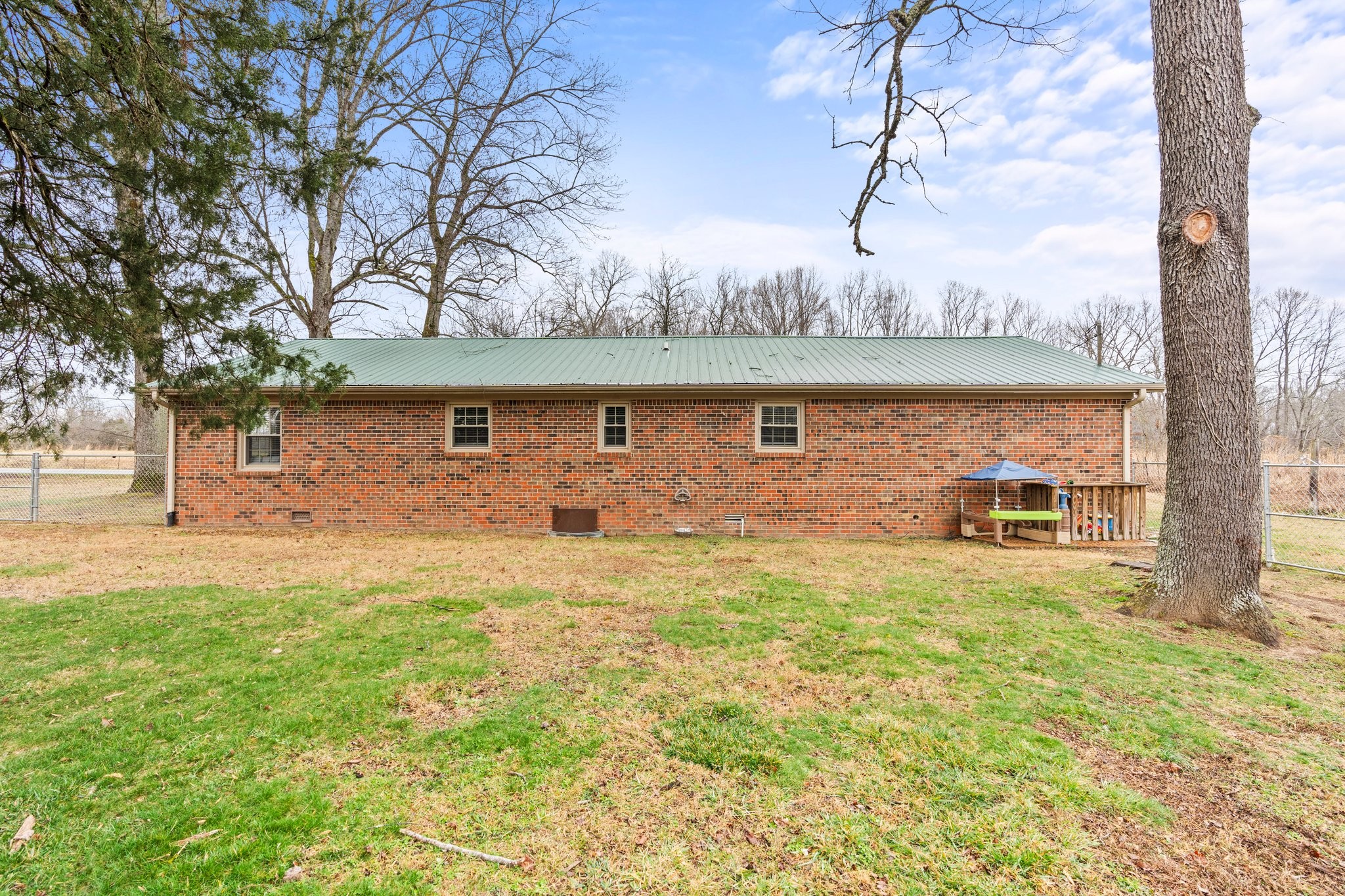 759 Little Hurricane Road Winchester, TN 37398 - Photo 26 of 30 a front view of a house with a yard garage and outdoor seating
