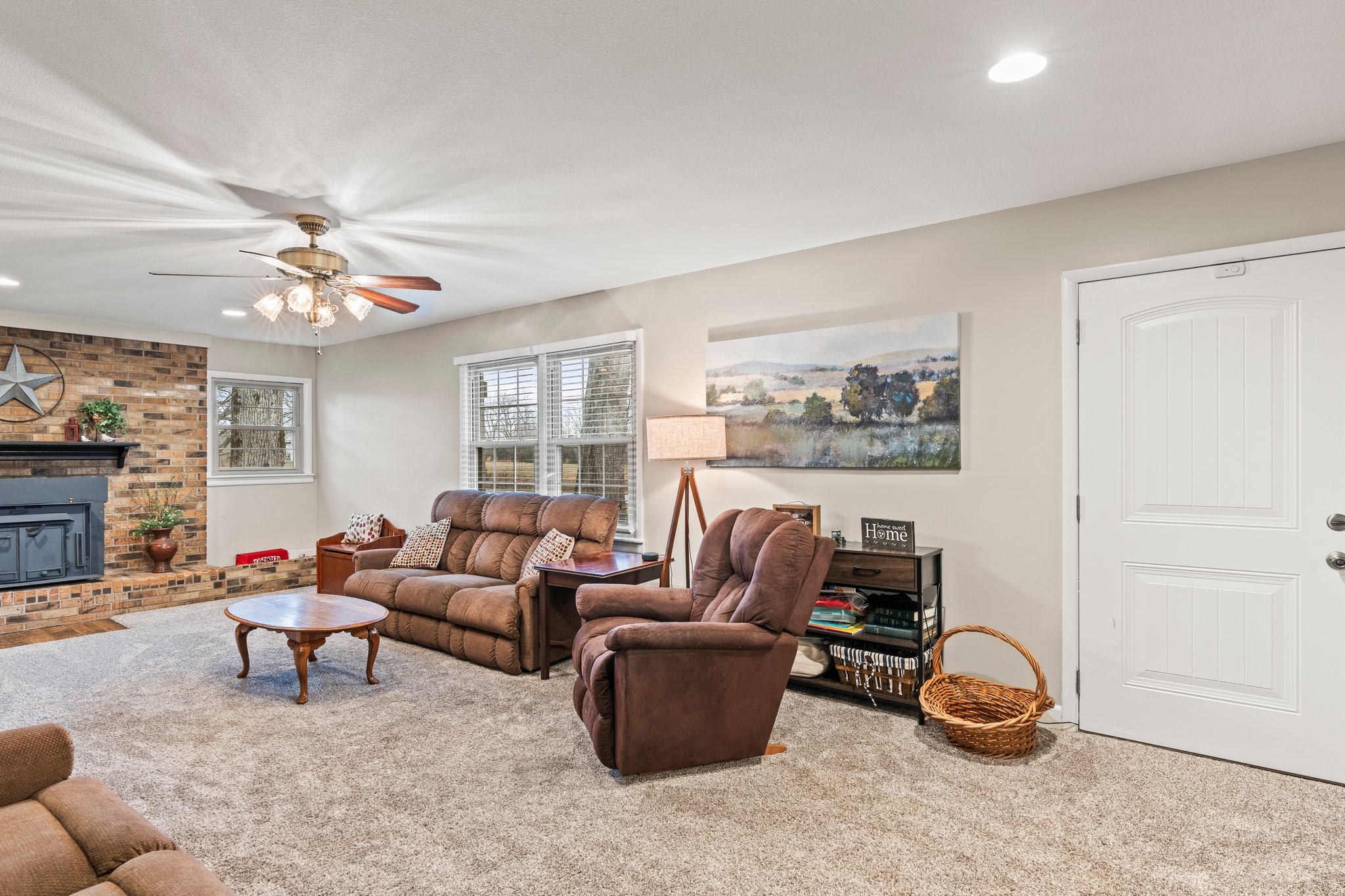 759 Little Hurricane Road Winchester, TN 37398 - Photo 9 of 30 a living room with furniture a fireplace and a window