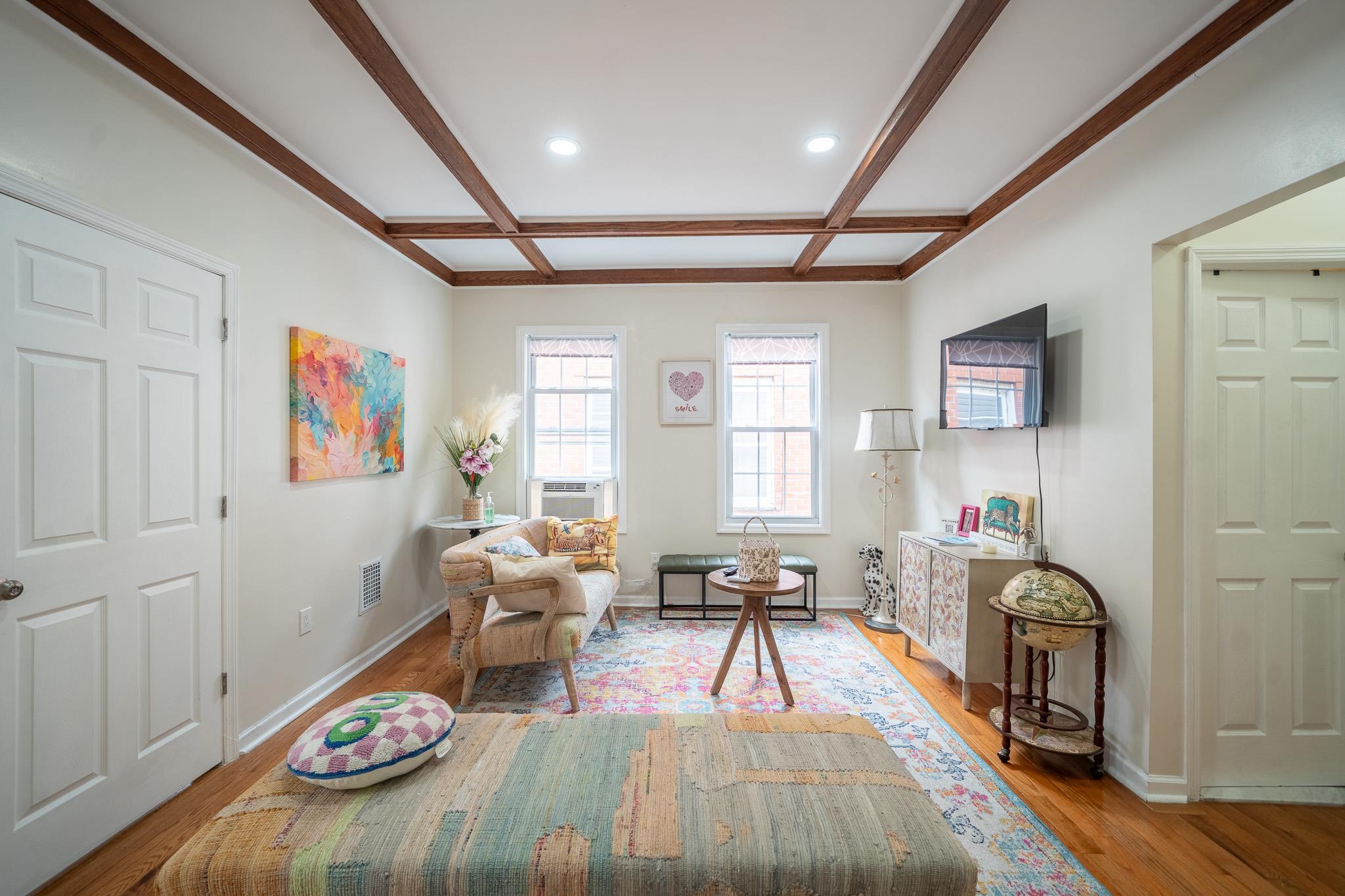 104-21 Lefferts Boulevard Queens, NY 11419 - Photo 15 of 29 a very nice looking room with a large window