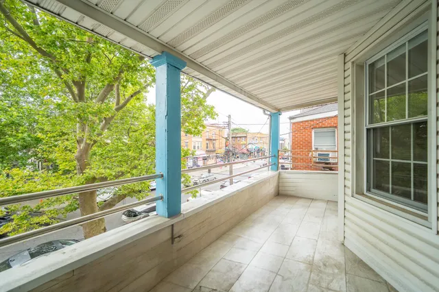 a view of a building from a balcony