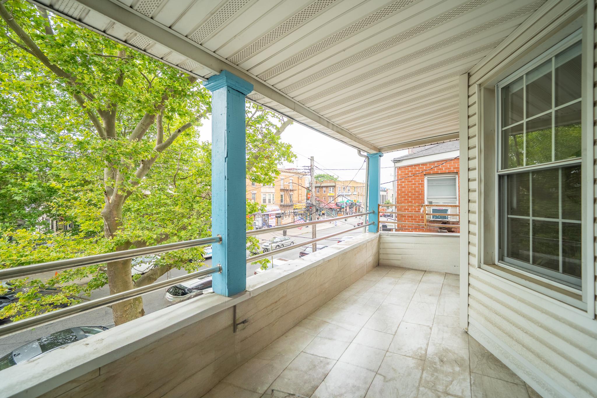 104-21 Lefferts Boulevard Queens, NY 11419 - Photo 27 of 29 a view of a building from a balcony