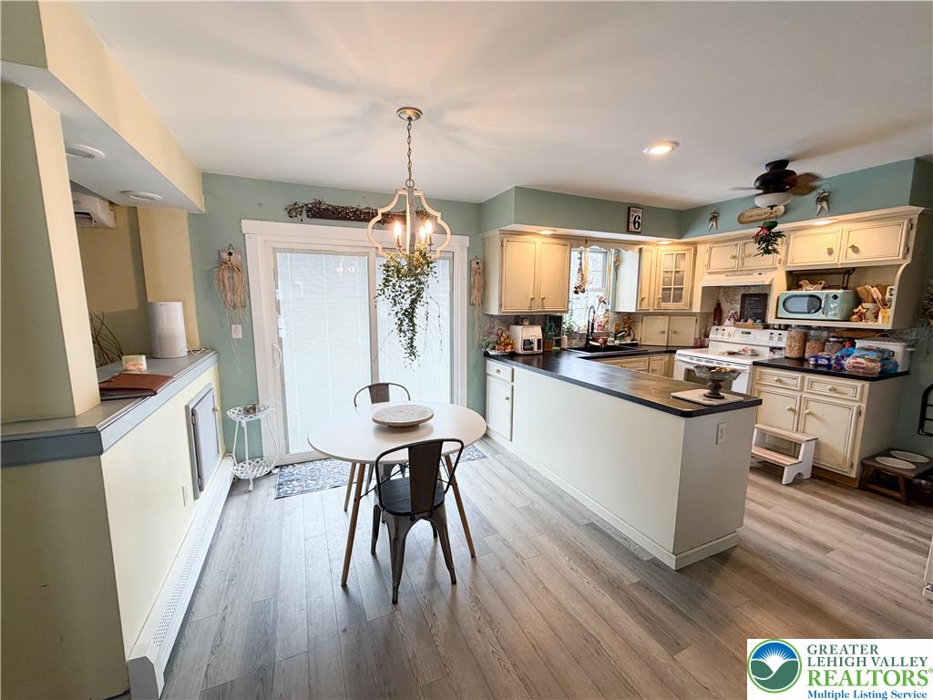303 East Mountain Top Road Summit Hill, PA 18250 - Photo 12 of 31 a kitchen with a table and chairs in it
