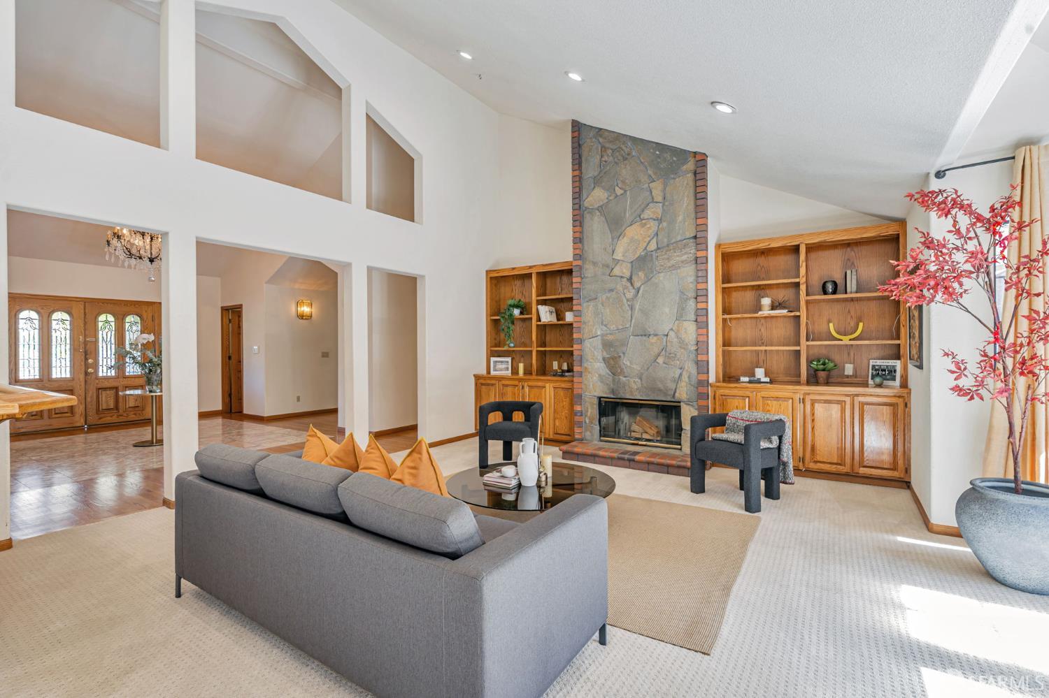 165 Pine Creek Road Walnut Creek, CA 94598 - Photo 20 of 79 a living room with furniture and a fireplace
