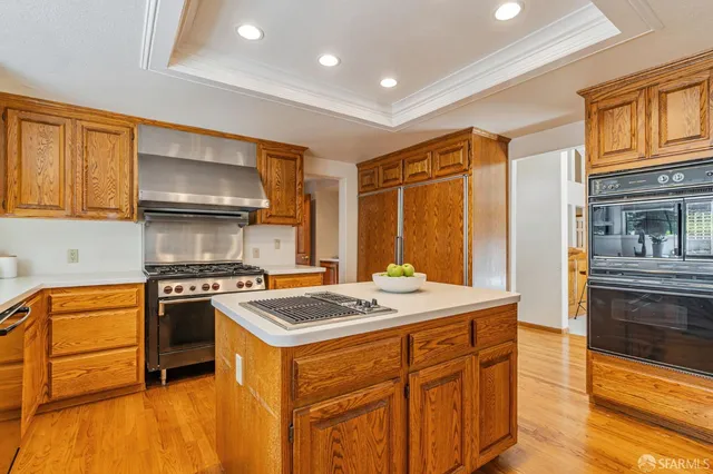 a view of a livingroom with a ceiling fan and window