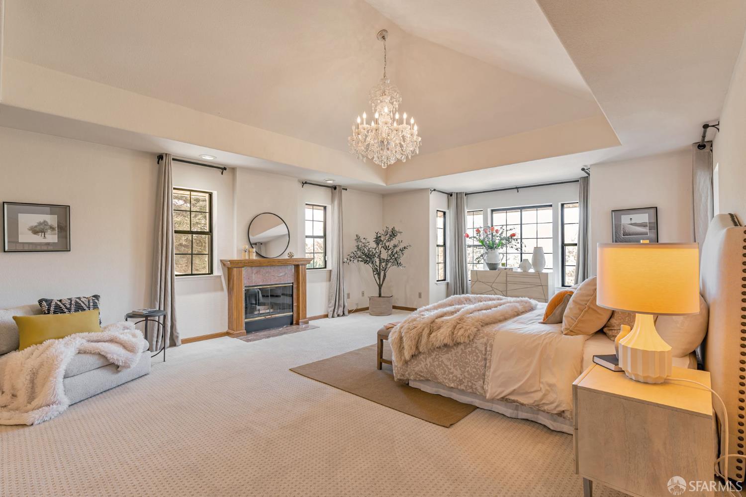 165 Pine Creek Road Walnut Creek, CA 94598 - Photo 34 of 79 a spacious bedroom with a bed large window and couch