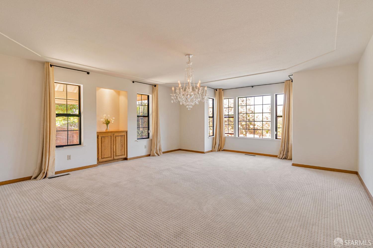 165 Pine Creek Road Walnut Creek, CA 94598 - Photo 45 of 79 wooden floor and windows in an empty room