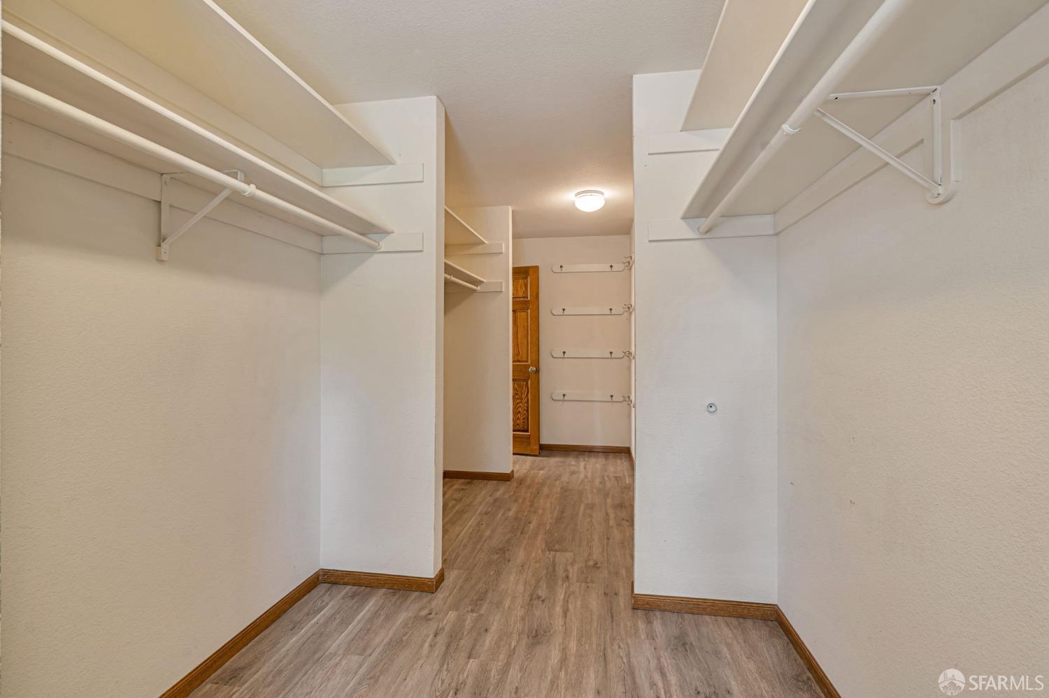 165 Pine Creek Road Walnut Creek, CA 94598 - Photo 49 of 79 a view of hallway with wooden floor