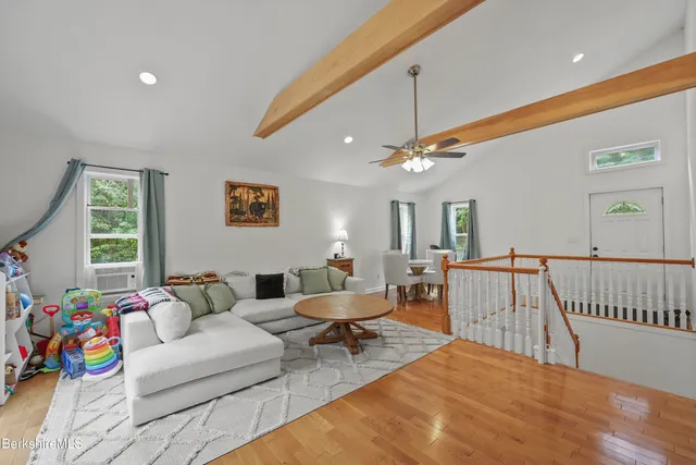 a view of a balcony and an entryway of the house