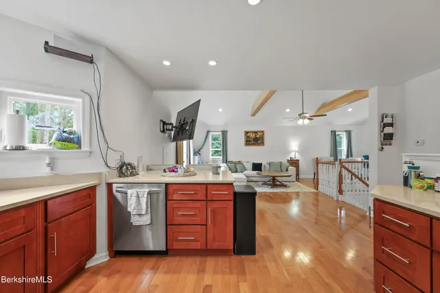 a bedroom with a bed and dresser