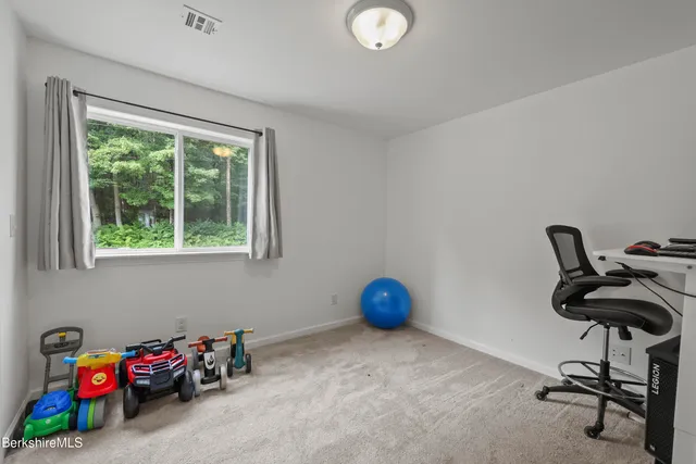 a bathroom with a shower and a tub