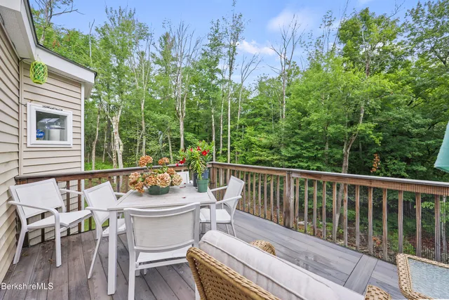 a room with a bed and a window