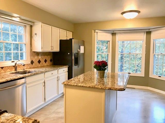 16 Pacers Ridge Drive Canonsburg, PA 15317 - Photo 3 of 23 White cabinets with beautiful granite countertops and stainless steel appliances.