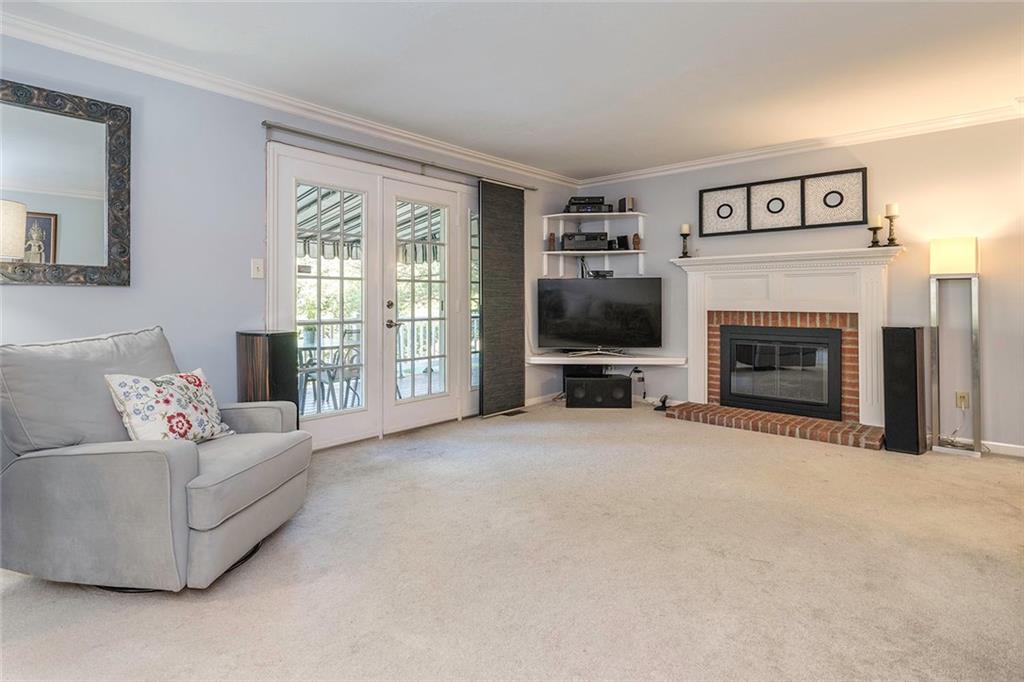 16 Pacers Ridge Drive Canonsburg, PA 15317 - Photo 7 of 23 Family room with access to the covered deck.