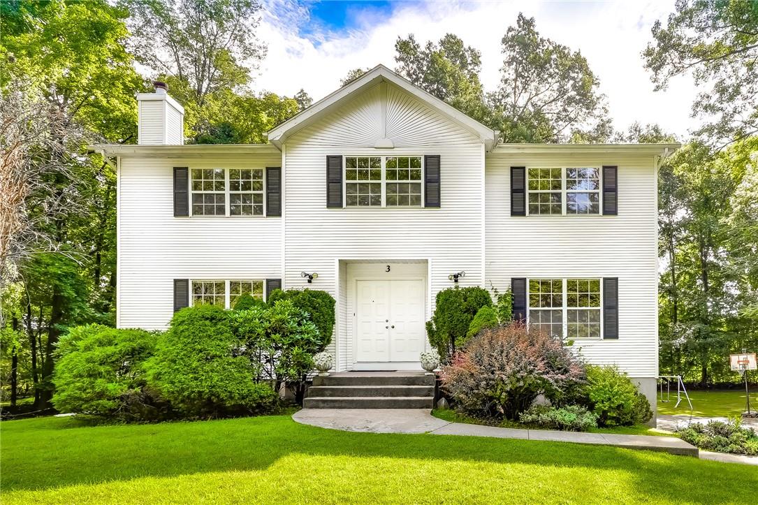 3 Kim Lane Spring Valley, NY 10977 - Photo 1 of 1 a front view of a house with a yard