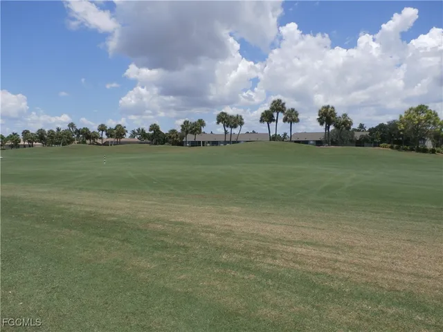 a view of a lake and houses