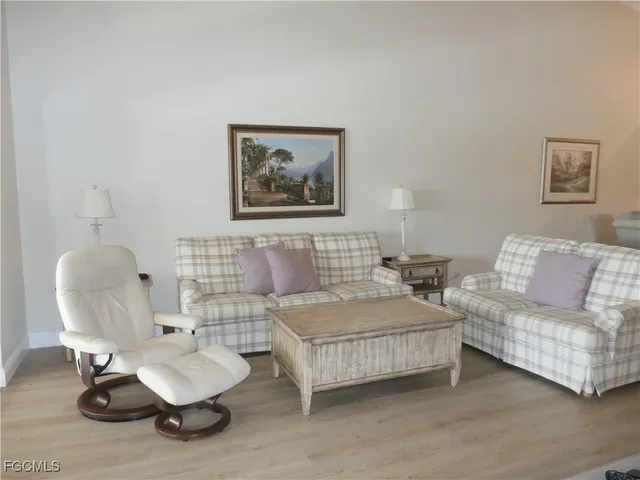 a living room with a couch and a table