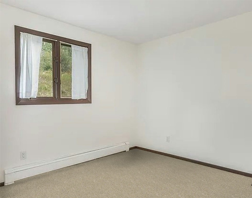 2099 Chamonix Lane, Unit 1A Vail, CO 81657 - Photo 12 of 29 an empty room with a window
