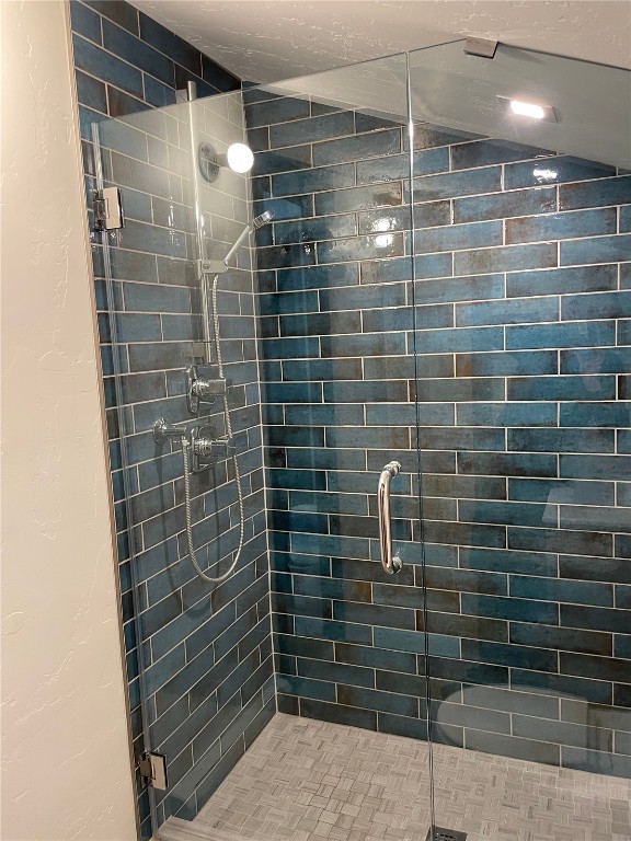 2099 Chamonix Lane, Unit 1A Vail, CO 81657 - Photo 16 of 29 a bathroom with a shower