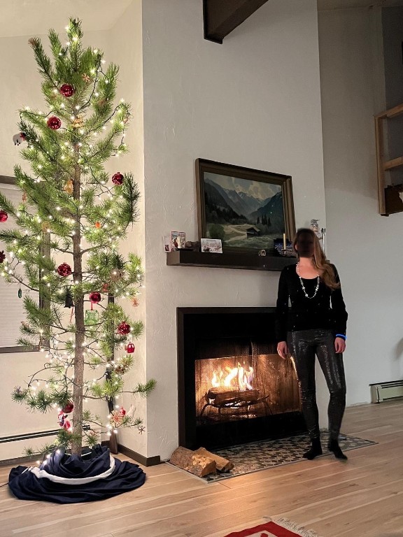 2099 Chamonix Lane, Unit 1A Vail, CO 81657 - Photo 2 of 29 a living room with furniture and a fireplace