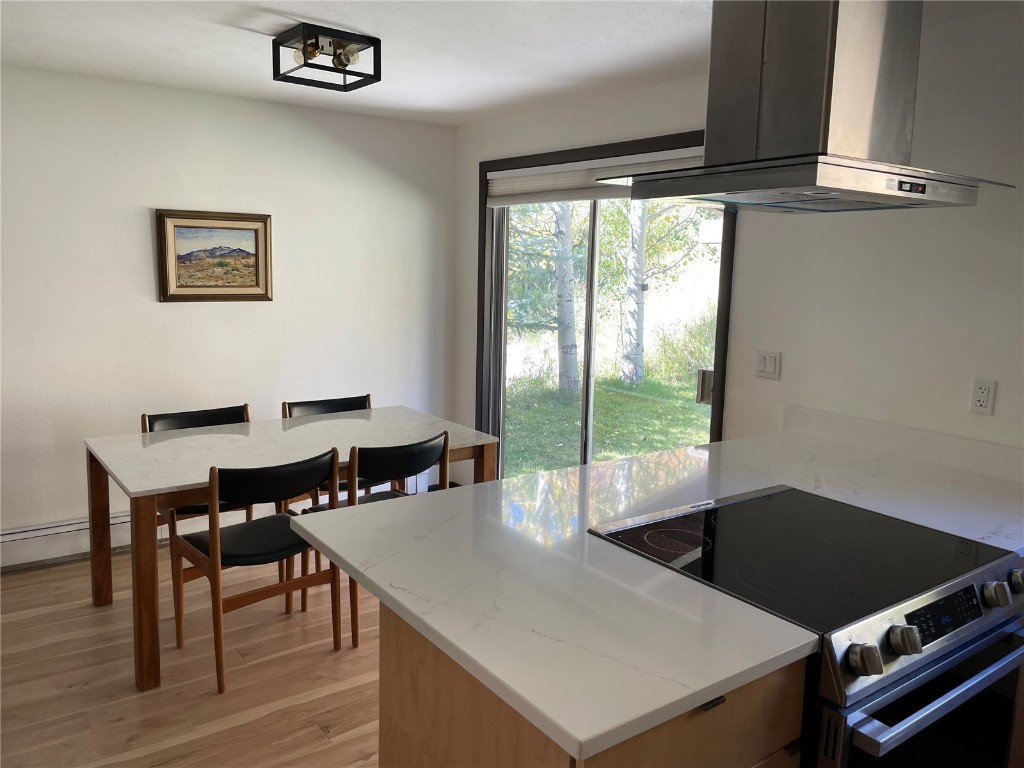 2099 Chamonix Lane, Unit 1A Vail, CO 81657 - Photo 6 of 29 a view of a dining room with furniture window and outside view
