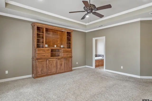 a view of a kitchen with a sink and cabinet