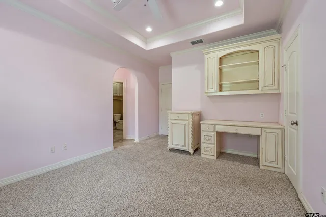 a view of empty room with front door