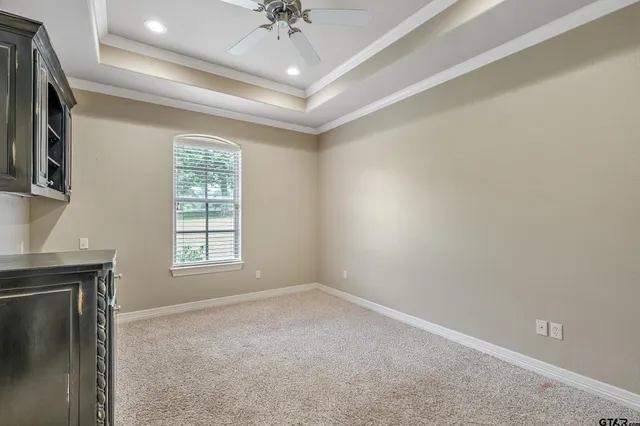 an empty room with a empty space and a window