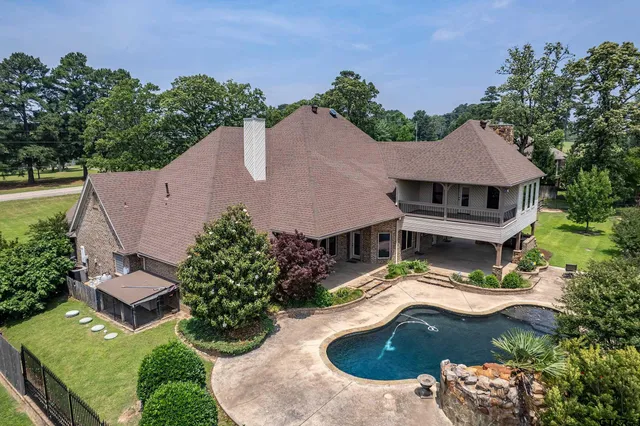an aerial view of a house with a garden