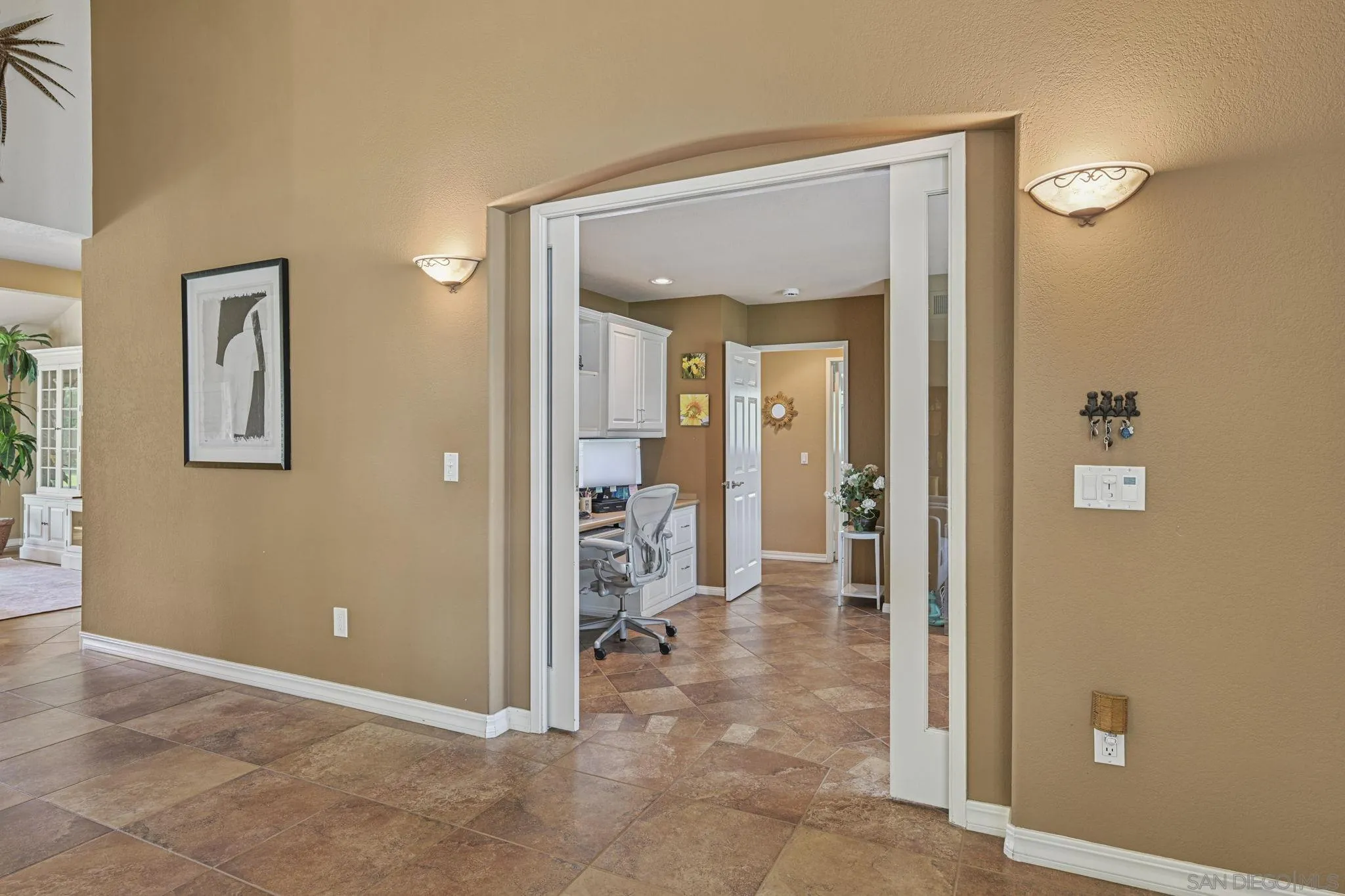 602 Hollyridge Drive Encinitas, CA 92024 - Photo 18 of 50 hallway with wooden floor and a bathroom