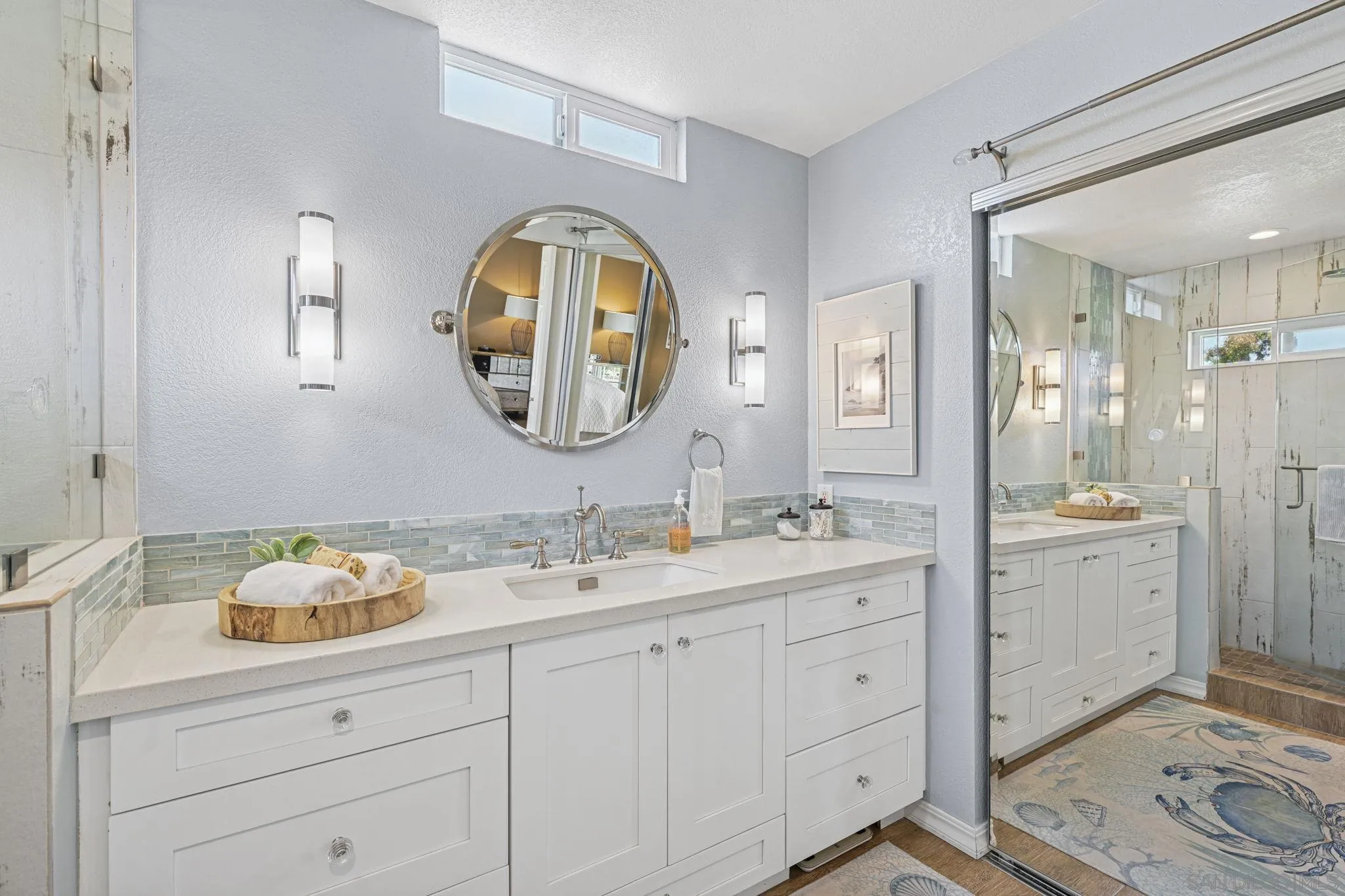 602 Hollyridge Drive Encinitas, CA 92024 - Photo 30 of 50 a spacious bathroom with a granite countertop sink mirror and bathtub