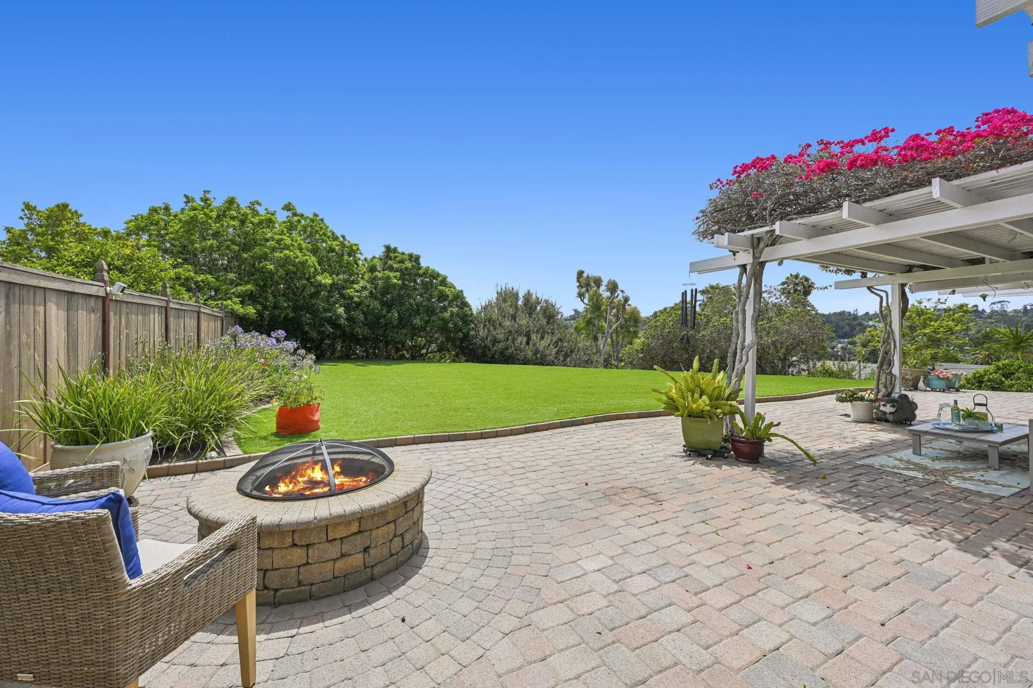 602 Hollyridge Drive Encinitas, CA 92024 - Photo 34 of 50 a view of a backyard with sitting area and entertaining space