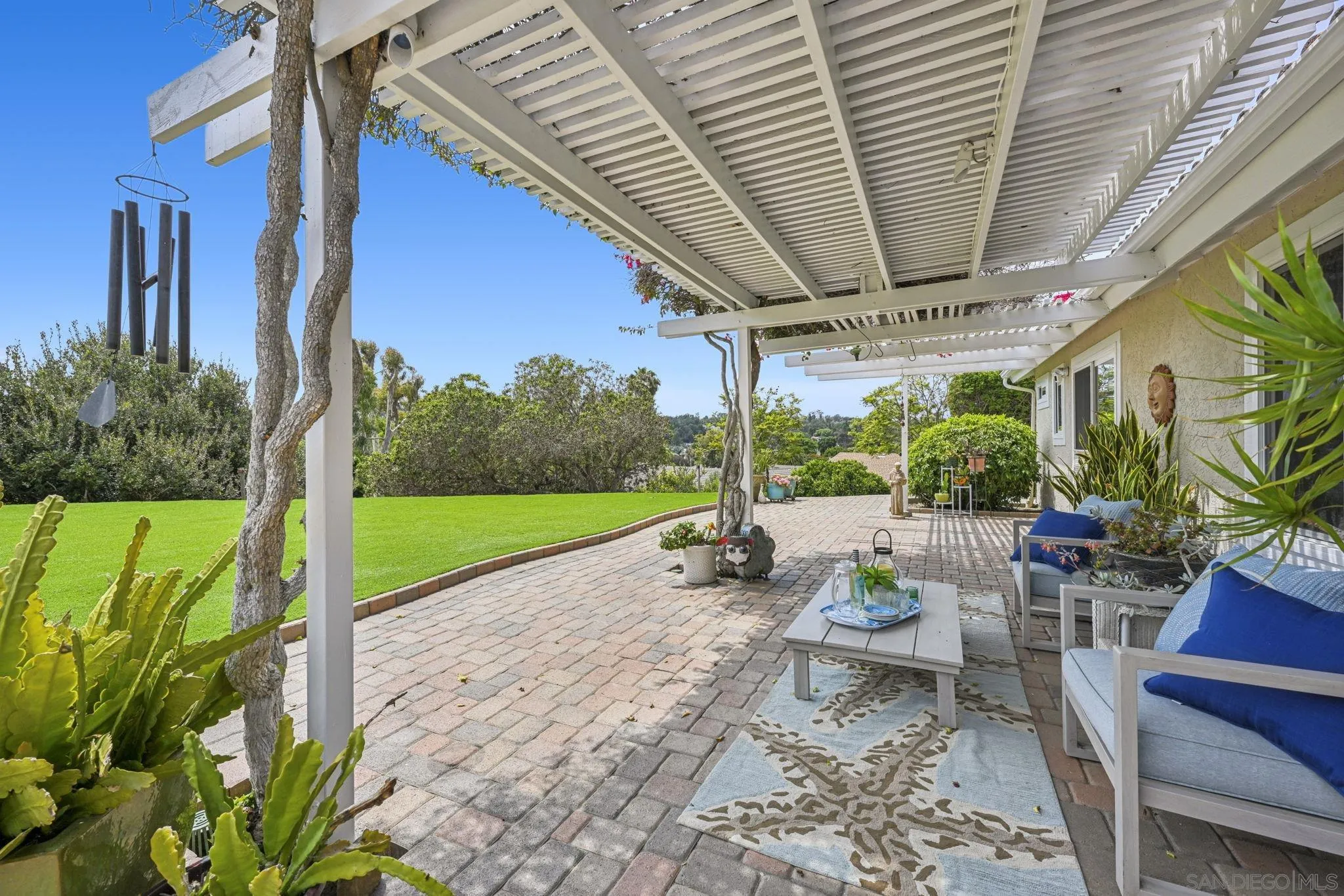602 Hollyridge Drive Encinitas, CA 92024 - Photo 35 of 50 a view of a porch with furniture and garden
