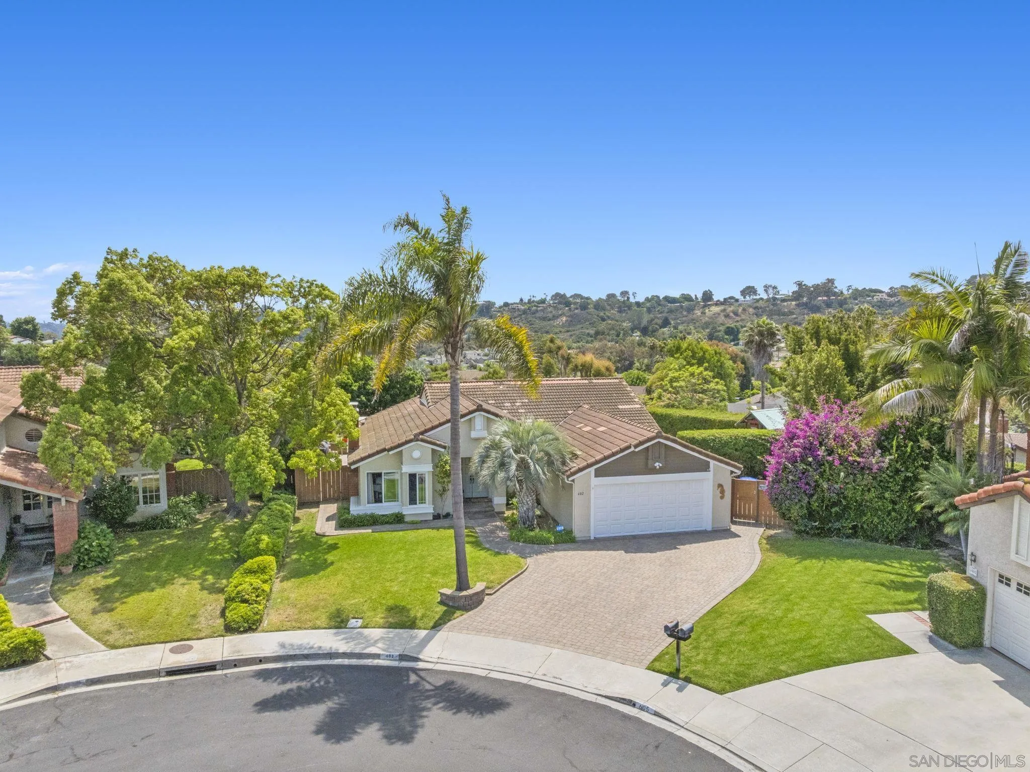 602 Hollyridge Drive Encinitas, CA 92024 - Photo 44 of 50 a front view of house with yard and green space