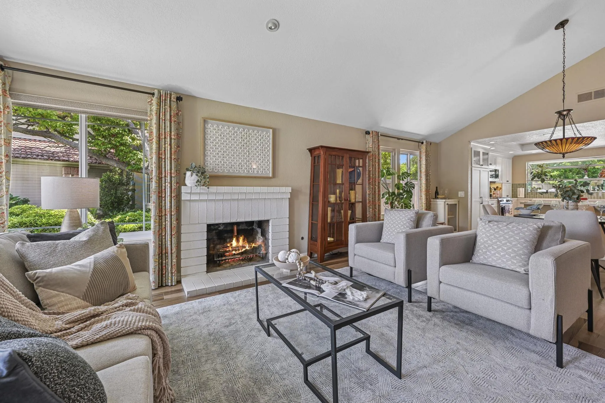 602 Hollyridge Drive Encinitas, CA 92024 - Photo 5 of 50 a living room with furniture and a fireplace