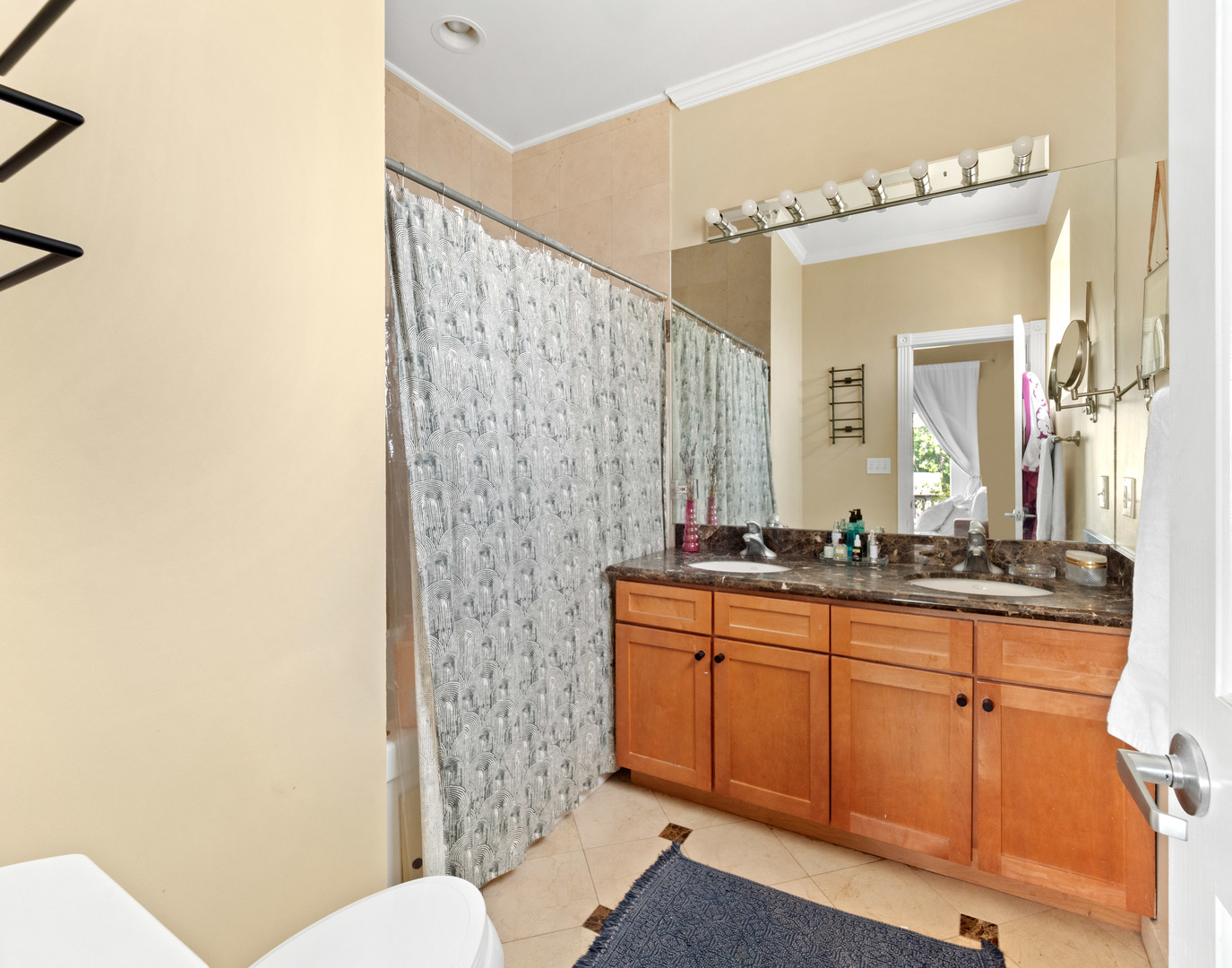 838 North Greenview Avenue, Unit 3 Chicago, IL 60642 - Photo 13 of 18 a bathroom with a granite countertop sink mirror vanity and toilet