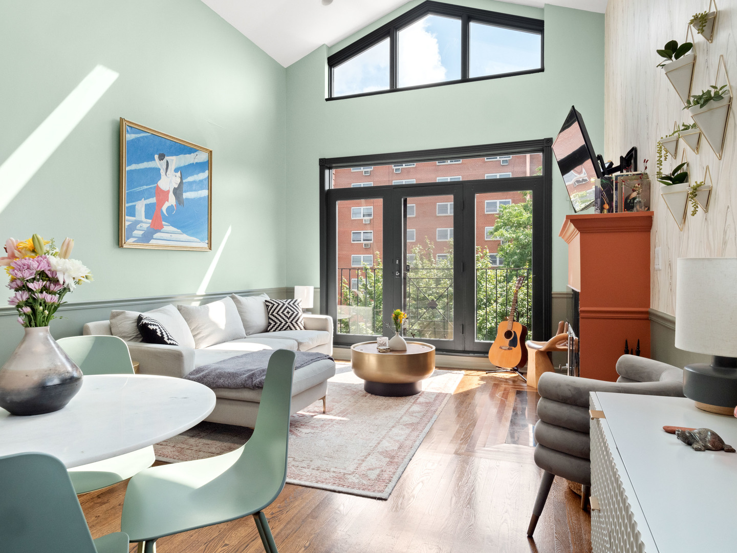 838 North Greenview Avenue, Unit 3 Chicago, IL 60642 - Photo 4 of 18 a living room with furniture and a large window