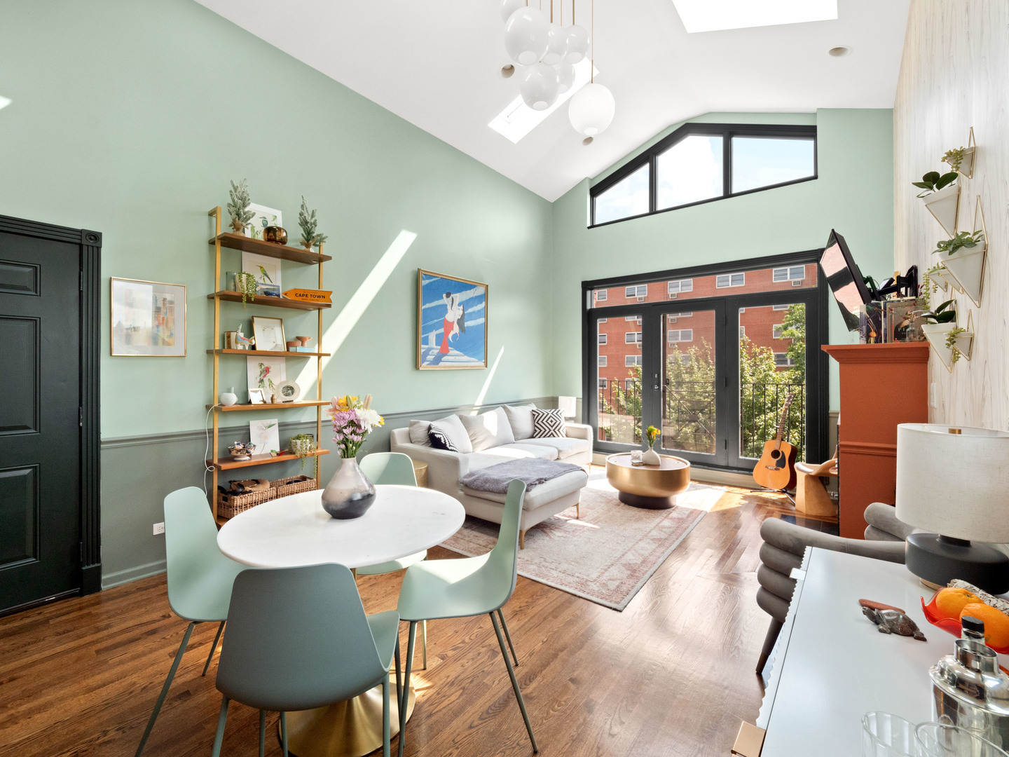 838 North Greenview Avenue, Unit 3 Chicago, IL 60642 - Photo 5 of 18 a living room with furniture or couch and a large window