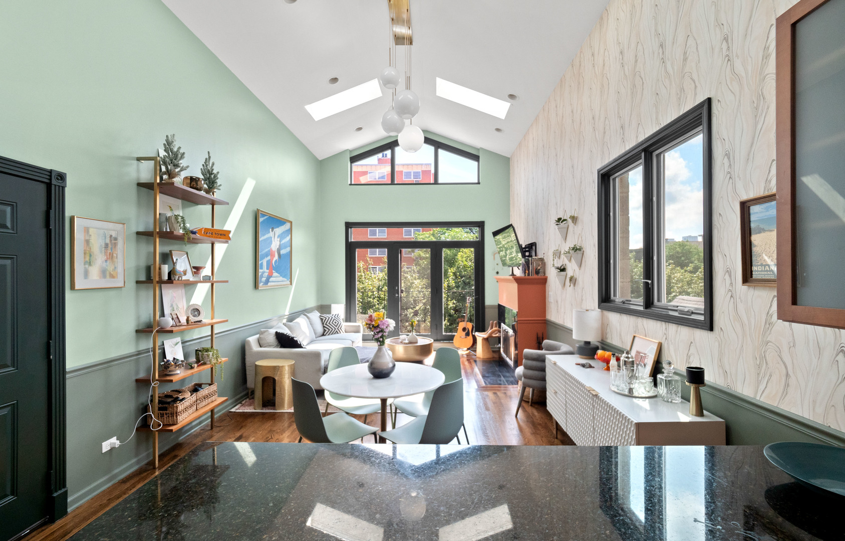 838 North Greenview Avenue, Unit 3 Chicago, IL 60642 - Photo 7 of 18 a living room with fireplace furniture and a large window