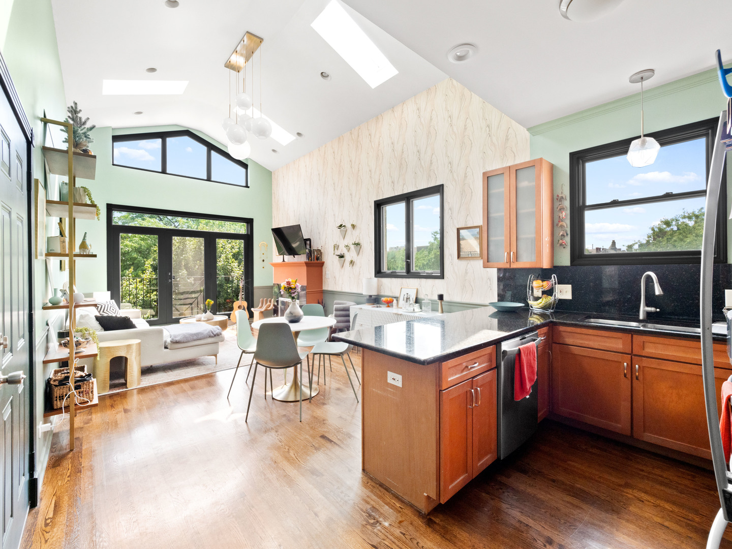 838 North Greenview Avenue, Unit 3 Chicago, IL 60642 - Photo 10 of 18 a large kitchen with cabinets a sink a counter space and stainless steel appliances