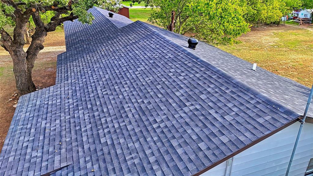 607 Baylor Street Nocona, TX 76255 - Photo 19 of 23 a view of a black and white building