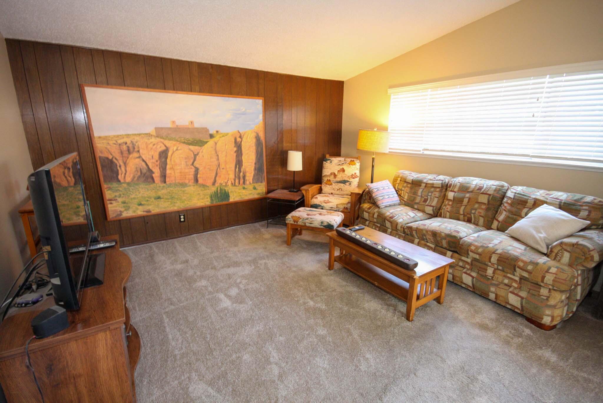 648 Dara Road Goleta, CA 93117 - Photo 13 of 14 a living room with furniture and a flat screen tv