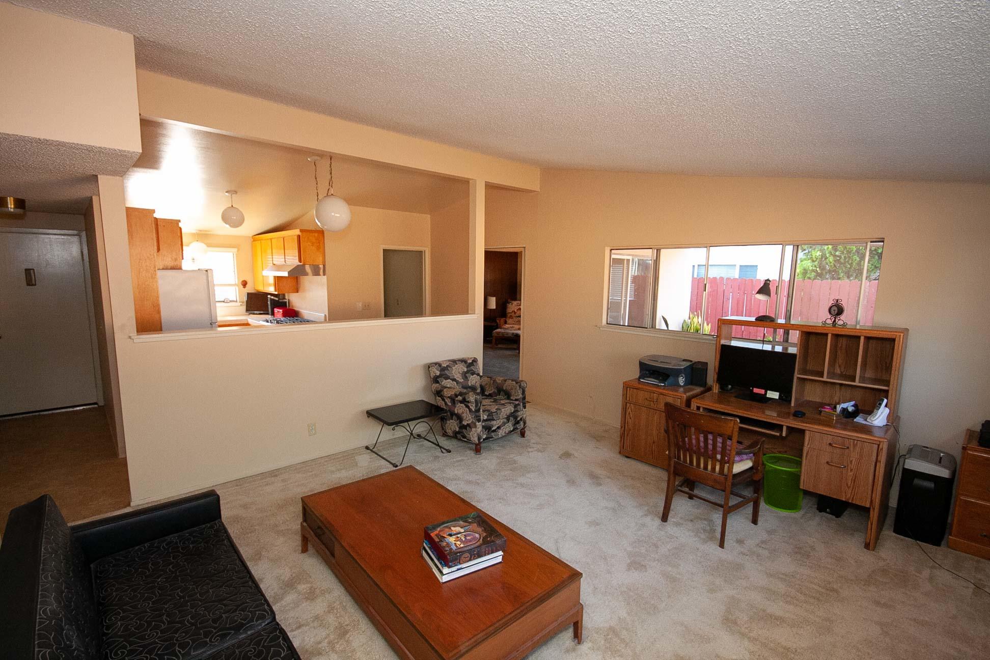 648 Dara Road Goleta, CA 93117 - Photo 3 of 14 a room with furniture and a wooden floor