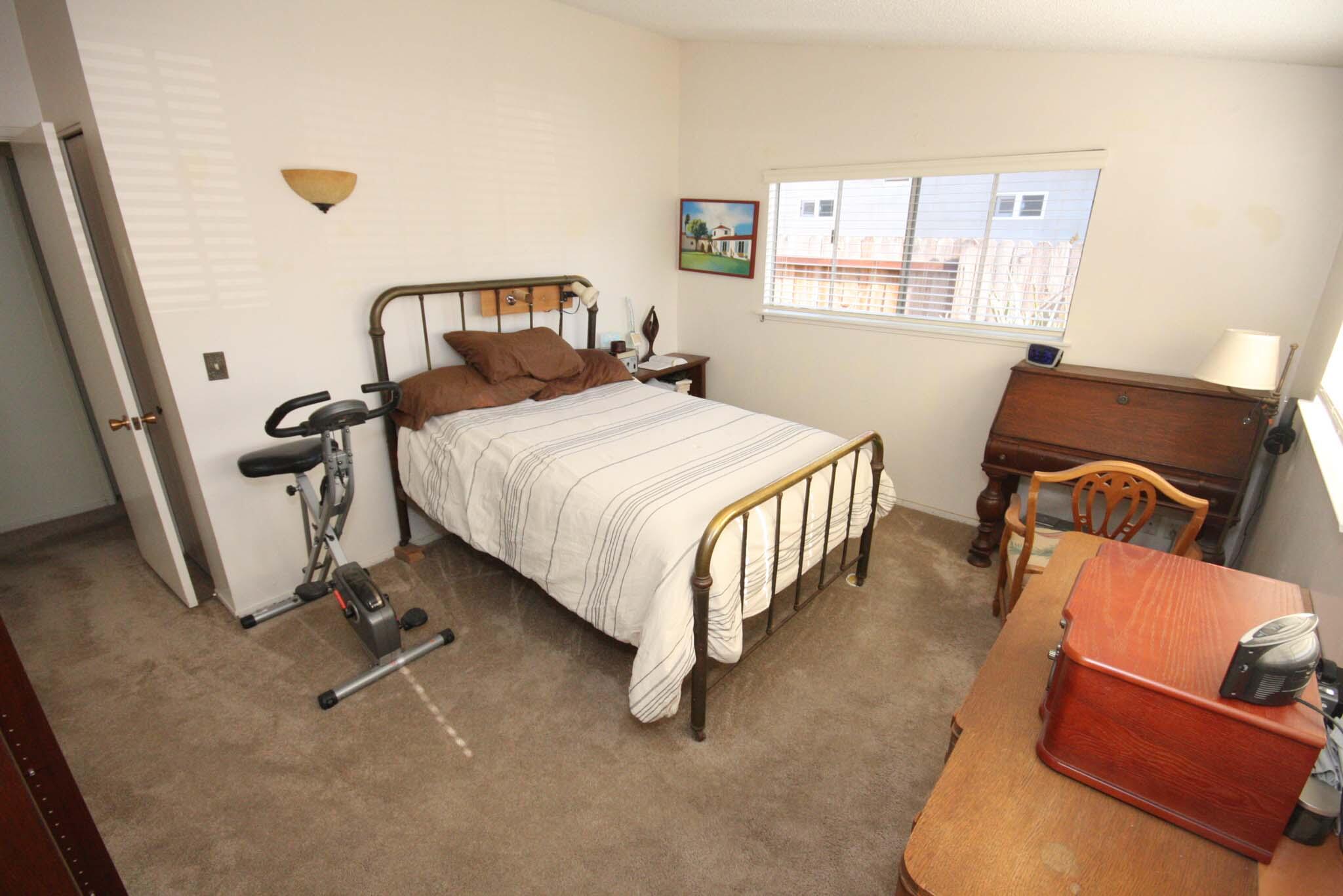 648 Dara Road Goleta, CA 93117 - Photo 10 of 14 a bedroom with bed and a window