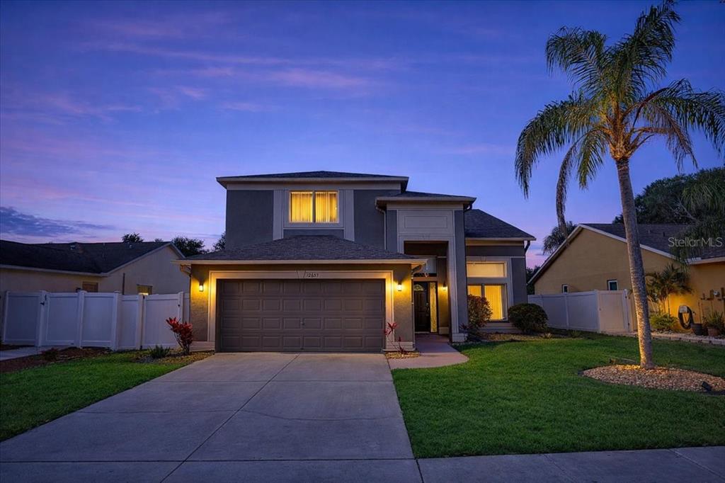 12657 Longcrest Drive Riverview, FL 33579 - Photo 1 of 55 a front view of house with yard and green space
