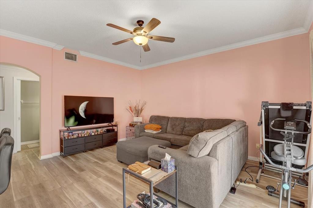 12657 Longcrest Drive Riverview, FL 33579 - Photo 12 of 55 a living room with furniture and a flat screen tv