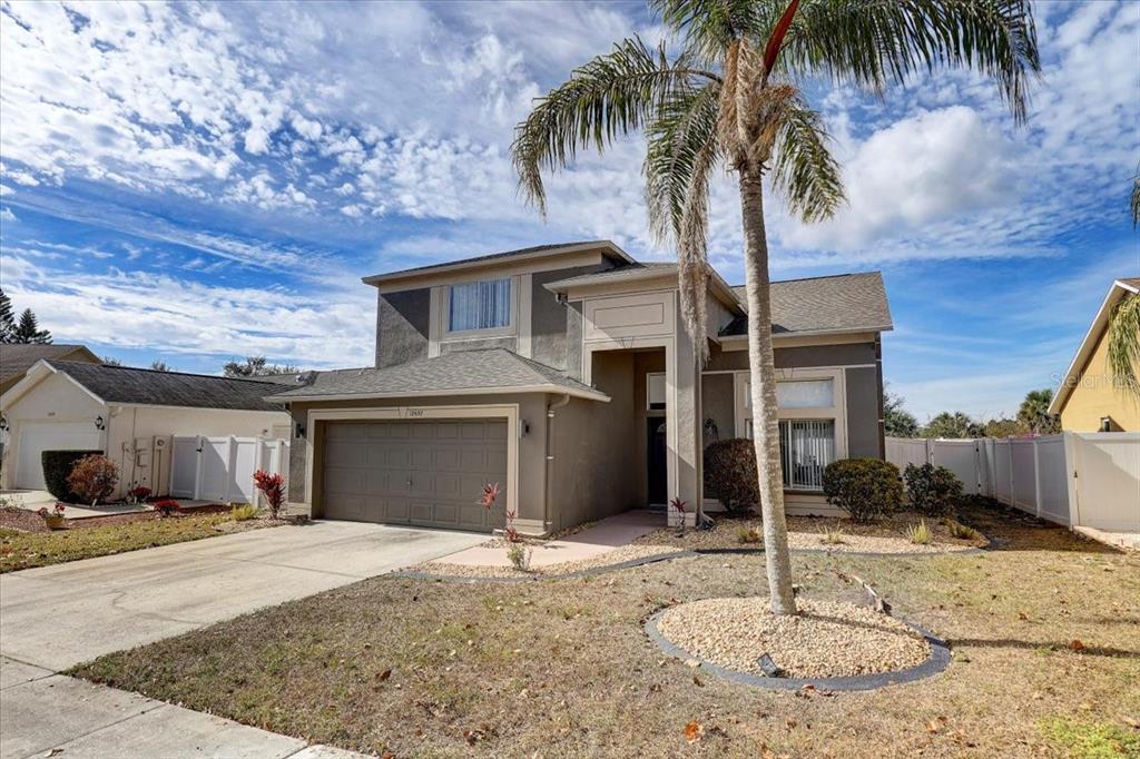 12657 Longcrest Drive Riverview, FL 33579 - Photo 39 of 55 a front view of a house with a yard