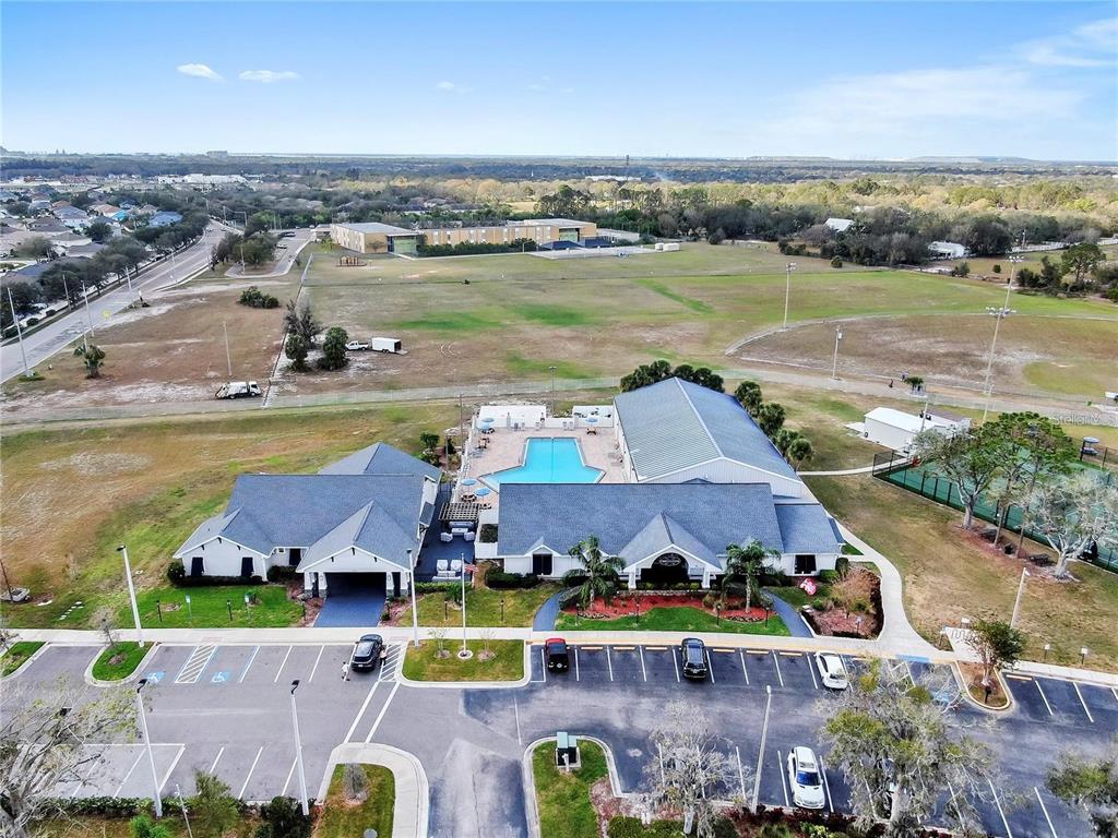 12657 Longcrest Drive Riverview, FL 33579 - Photo 54 of 55 an aerial view of a house with a lake view